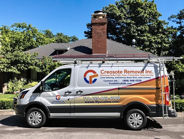 Simsbury Chimney Sweep technician removing creosote safely in Simsbury, CT